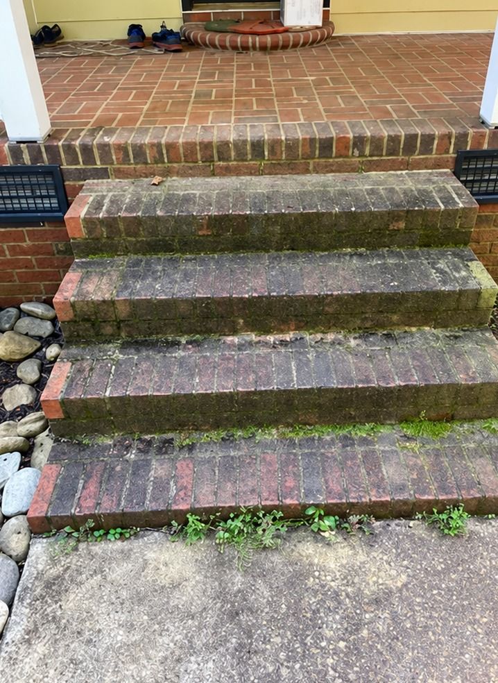 Brick front steps and walkway before cleaning